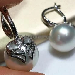 Takaramonobr 12.0-13.0 Mm White South Sea Pearl Wing Earrings Mounted On 18-Karat Yellow/White Gold Different Pearl Type In Same Style