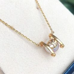 Takaramonobr Quadrant 8.0-8.5 Mm White Akoya Pearl Pendant Mounted On 18-Karat Yellow Gold Akoya Pearls