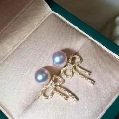 Takaramonobr Bowknot 7.0-7.5 Mm White Japanese Akoya Pearl Earrings With Diamonds In 18K Gold