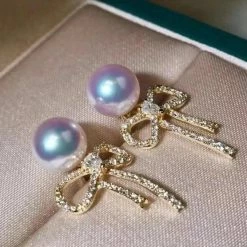 Takaramonobr Bowknot 7.0-7.5 Mm White Japanese Akoya Pearl Earrings With Diamonds In 18K Gold