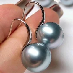 Takaramonobr Raindrop 11.0-12.0 Mm Tahitian Pearl Hook Earrings Mounted On 18-Karat Gold Blue Pearls