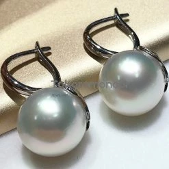 Takaramonobr 12.0-13.0 Mm White South Sea Pearl Wing Earrings Mounted On 18-Karat Yellow/White Gold Different Pearl Type In Same Style