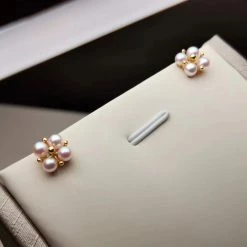 Takaramonobr Akoya Pearls Four Petal Rosette Round White Baby Pearl Earring Studs In Gold