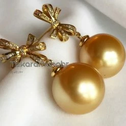 Takaramonobr Golden Ribbons 13.0-14.0 Mm Golden South Sea Pearl Earrings In Gold With Diamonds