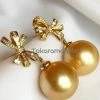 Takaramonobr Golden Ribbons 13.0-14.0 Mm Golden South Sea Pearl Earrings In Gold With Diamonds